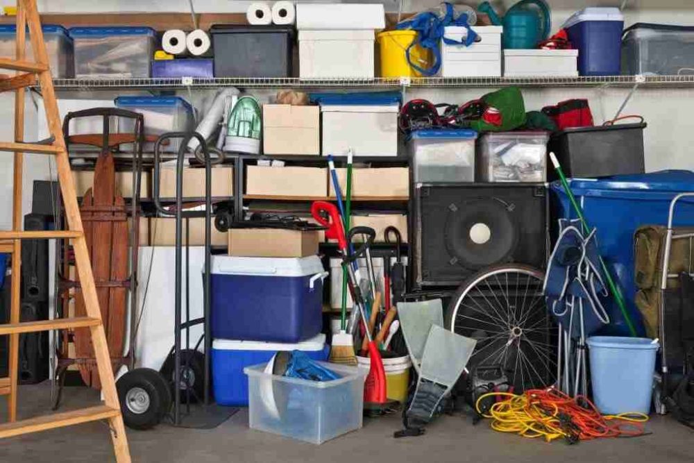 A busy garage packed with assorted items, representing a clean-out service in Los Angeles, CA.